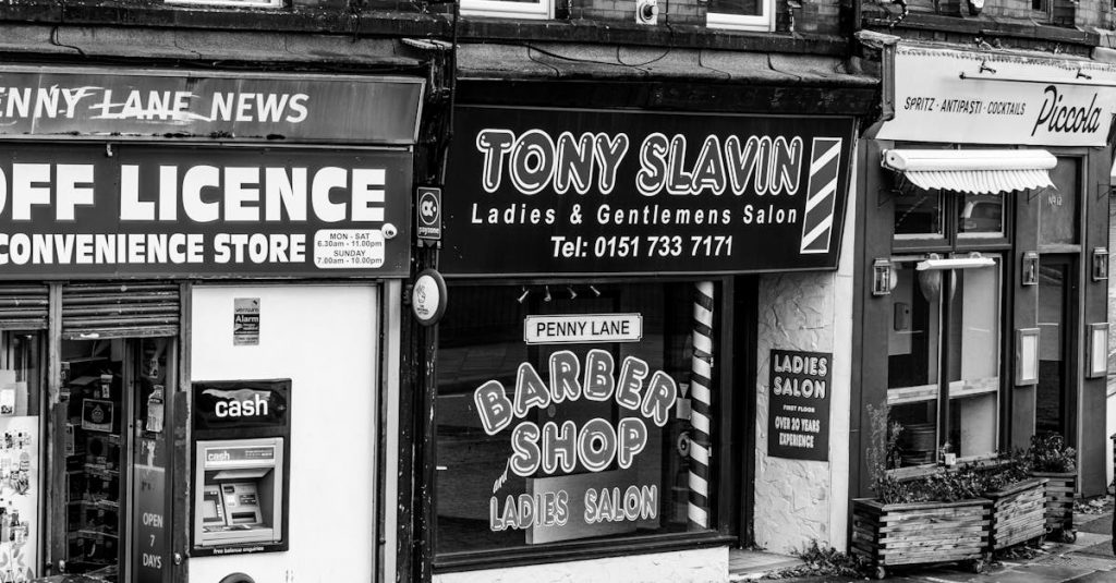 Black and white street view of Tony Slavin Barber Shop in Liverpool's Penny Lane.
